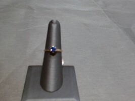  10kt yellow gold ring with bluish purple gemstone